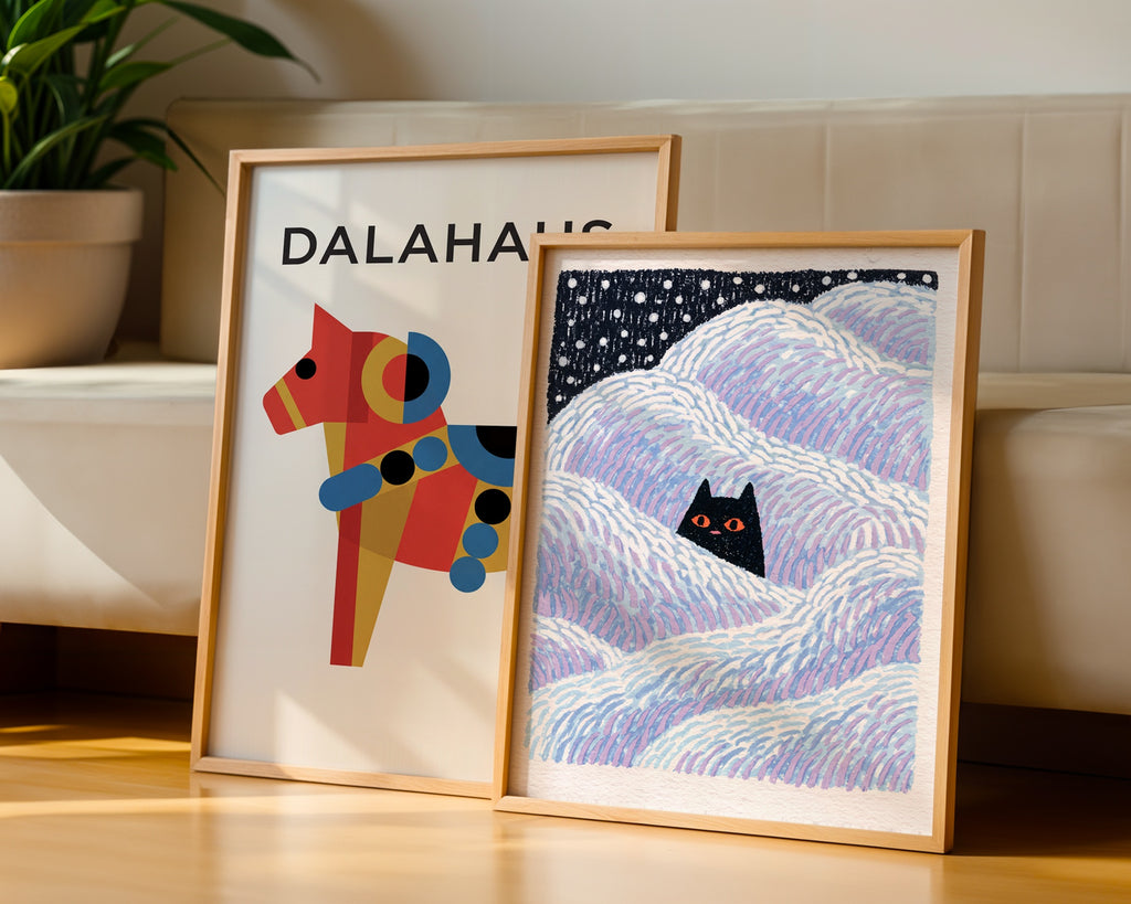 Hidden Cat Snowdrift Poster – två posters i rum 2